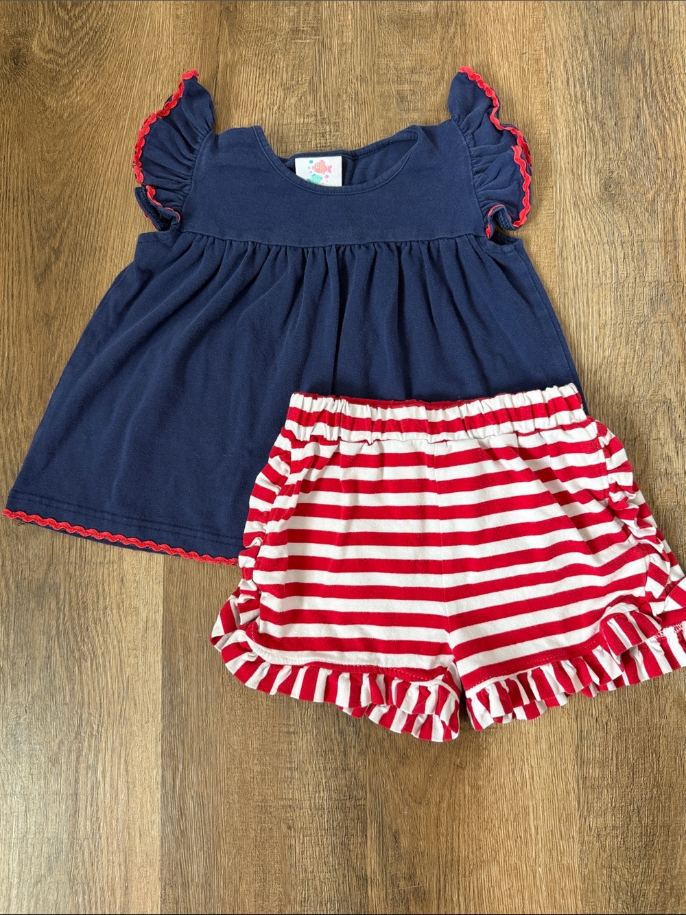 Stitchy Fish,Navy Flutter Sleeve Top & Red White Striped Ruffle Shorts